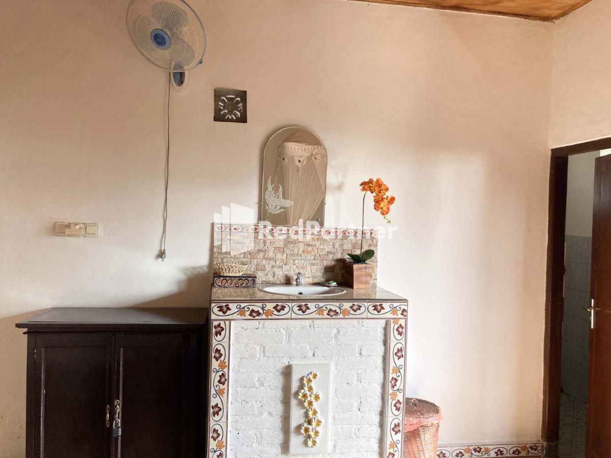 Taman Ayu Homestay Munduk Mitra Reddoorz Dış mekan fotoğraf