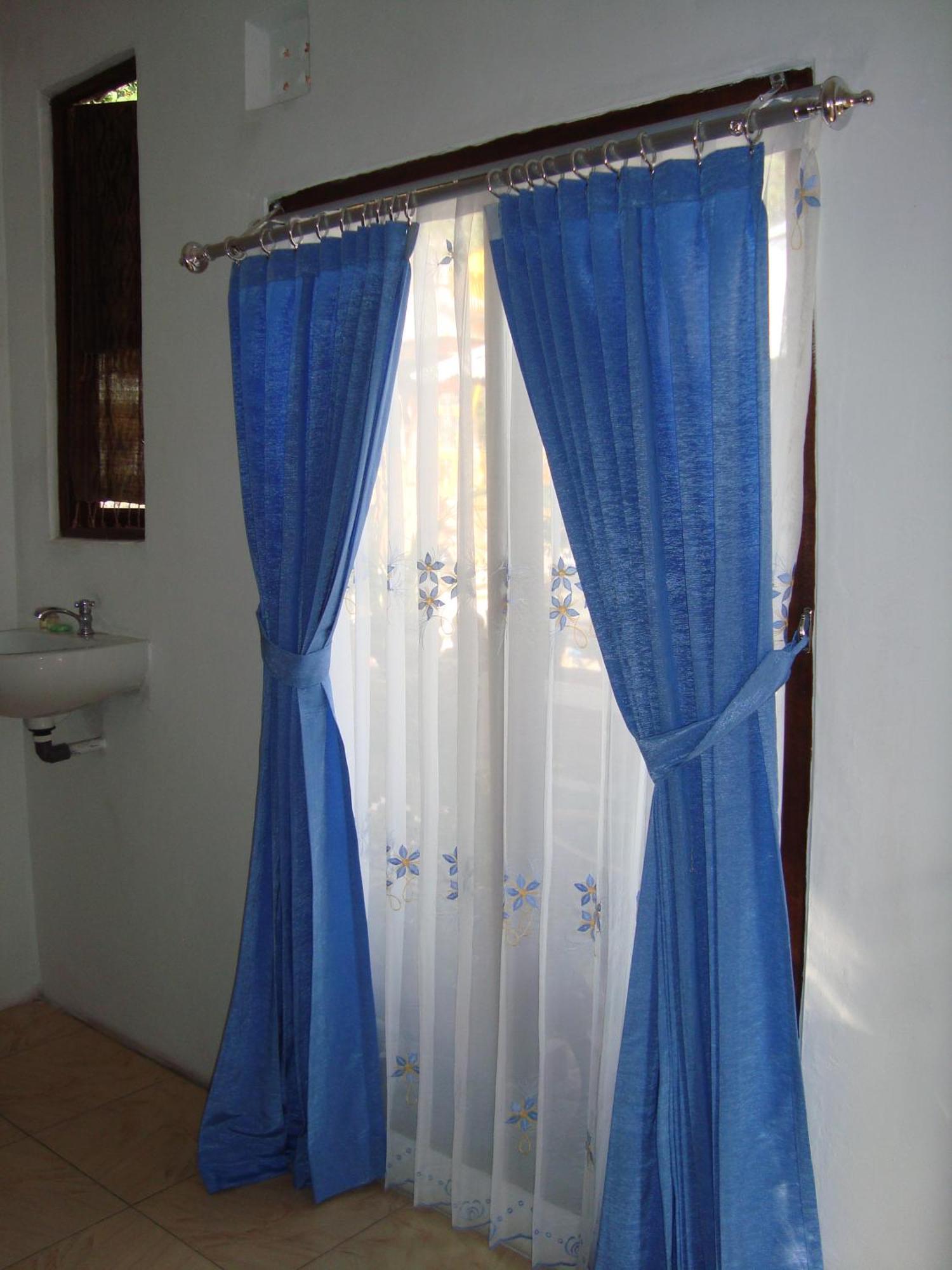 Taman Ayu Homestay Munduk Mitra Reddoorz Dış mekan fotoğraf